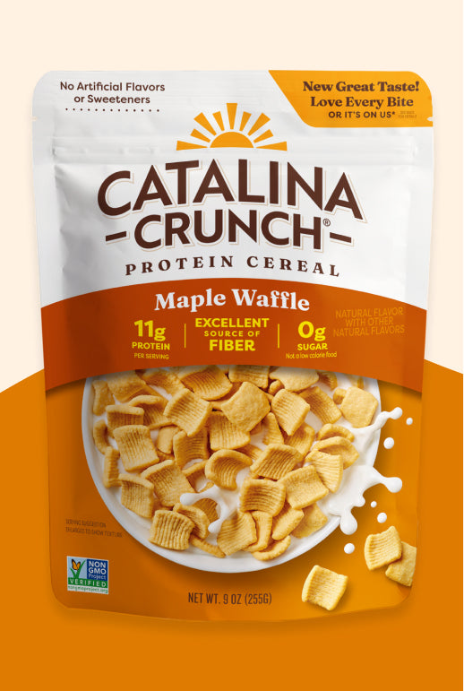 Package of Catalina Crunch protein cereal with maple waffle flavor on an orange background.