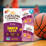Catalina Crunch protein cereal packaging with a basketball in the background