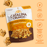 Catalina Crunch Protein Granola package with granola pieces on a beige background