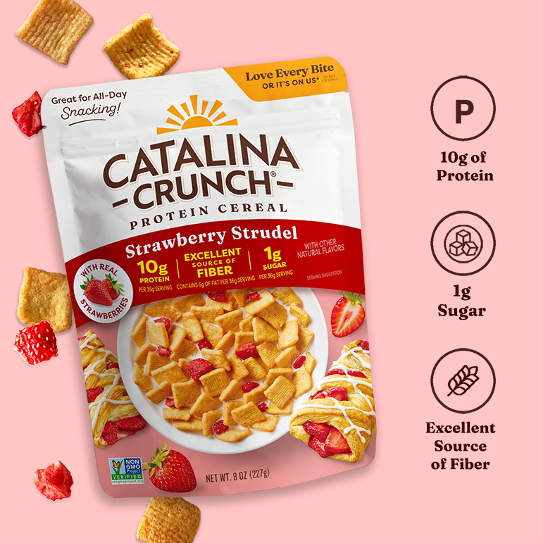 Catalina Crunch Strawberry Strudel protein cereal package on a pink background with nutritional information.