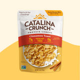Catalina Crunch Cinnamon Toast Protein Cereal package on a yellow background