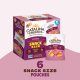 Catalina Crunch protein cereal packaging with snack size pouches on a pink background