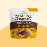Catalina Crunch Chocolate Cookie Bar Peanut Butter packaging on a beige background