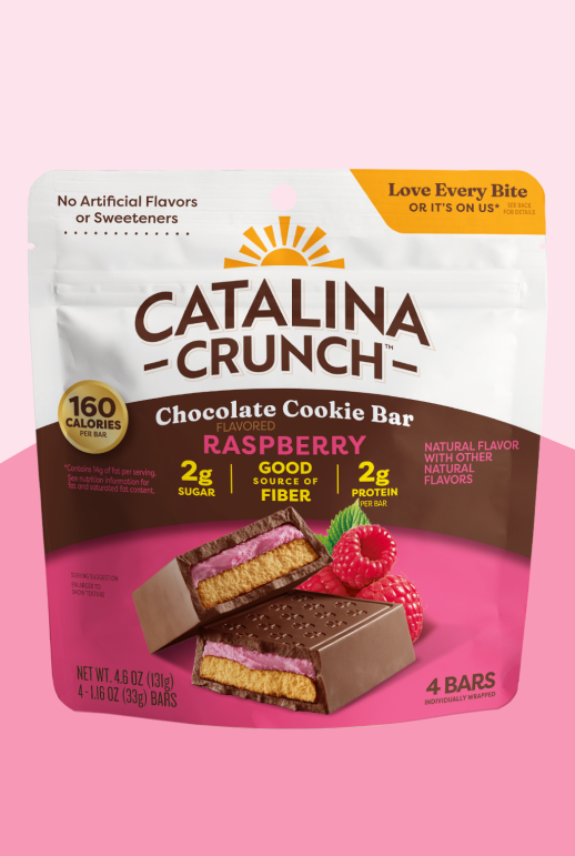 Catalina Crunch Chocolate Raspberry Cookie Bar packaging on a pink background