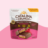 Catalina Crunch Chocolate Cookie Bar packaging on a pink background