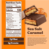 Nutrition label and packaging of a Sea Salt Caramel chocolate bar on an orange background.