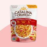 Catalina Crunch Protein Cereal Strawberry Strudel package on a pink background