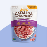 Catalina Crunch Protein Cereal package with triple berry blast flavor on a light blue background